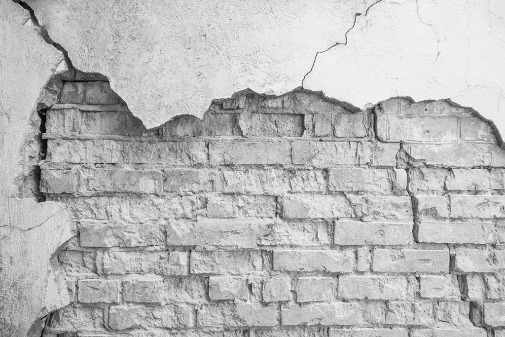 Фотообои Поломанная кирпичная стена
